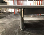 Load image into Gallery viewer, Modern gray metal table leg with a sleek angular design and polished finish for executive 12 person conference table