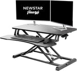 Load image into Gallery viewer, NEWSTAR 32 inch Desk Converter, K Series, Height Adjustable Sit to Stand Riser, Dual Monitor and Laptop Workstation with Wide Keyboard Tray, Black