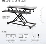 Load image into Gallery viewer, NEWSTAR 32 inch Desk Converter, K Series, Height Adjustable Sit to Stand Riser, Dual Monitor and Laptop Workstation with Wide Keyboard Tray, Black