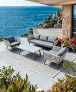 Load image into Gallery viewer, 4-Piece Outdoor Sofa Set with Table &amp; Waterproof Cushions – Weather-Resistant Patio Furniture for UAE Gardens, Balconies &amp; Terraces