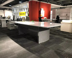 Load image into Gallery viewer, Modern silver-gray executive conference table with curved legs and reflective surface for luxury office meetings
