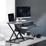 Load image into Gallery viewer, NEWSTAR 32 inch Desk Converter, K Series, Height Adjustable Sit to Stand Riser, Dual Monitor and Laptop Workstation with Wide Keyboard Tray, Black